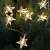Home by Somogyi star string lights on a Christmas tree