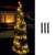 Home by Somogyi LED208C/WW LED string lights decorating a Christmas tree