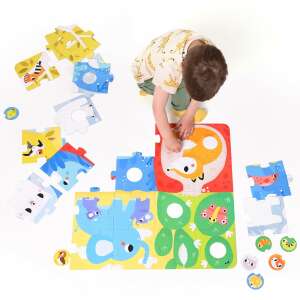 Child playing with CzuCzu Animals 34 piece puzzle, featuring colorful animals from around the world - Puzzle