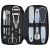 DUP FINTO 9-piece pedicure set in black leather case, including nail clippers, cuticle pusher, and foot files.