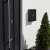 SmileHOME by Pepita black steel mailbox on a white wall near door