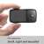 SJCAM C200 action camera, black, in hand