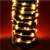 Close-up of warm white Micro LED string lights coiled