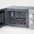 Severin MW 7887 microwave oven, open door, showing interior with turntable