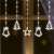 LED curtain lights with bells, stars and Christmas trees, white, 10 figures