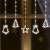 LED curtain lights with bells, stars and Christmas trees, white, 10 figures