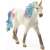 Schleich Narvál mén figura, egy fehér egyszarvú kék és lila csillogó sörénnyel és farokkal, fehér háttér előtt állva