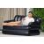 Woman relaxing on Bestway inflatable sofa bed