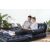 Couple relaxing on Bestway inflatable sofa bed with laptop