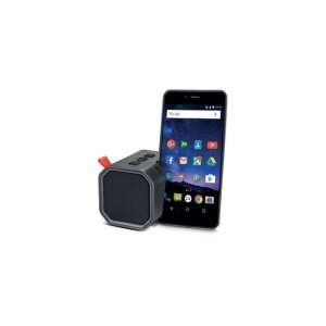 Difuzor Bluetooth portabil Maxcom Maxton Erebus cu un smartphone lângă el - Boxe Portabile
