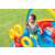 Boy playing with inflatable rings and ball in Intex Rainbow Ring Play Center inflatable pool