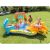 Family playing in Intex Dinosaur Inflatable Play Center Pool