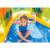 Intex inflatable dinosaur pool with a child playing in it