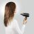 Woman holding Rowenta Express Style hair dryer