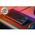 Водоустойчива геймърска клавиатура SteelSeries Apex 3 TKL на бюро с мишка и слушалки
