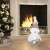 LED illuminated ceramic snowman Christmas decoration in a home setting