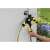 Kärcher WT 2.000 water timer, black and yellow, 3 hose connections, 120 minutes timer, hand connecting a hose