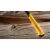 Close-up of DEWALT demolition hammer handle on wood surface