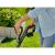 Close-up of Gardena EasyCut 23/18V P4A cordless grass trimmer handle in use.