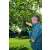 Man using Gardena TCS 20/18V P4A Telescopic Pole Saw to trim branches of a tree