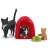 Schleich Farm World Cat Family, a black and white cat with two kittens, one orange and one black and white, near a red cat house and a green food bowl