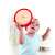 Baby playing with Hape Top-along Tambourine, wooden tambourine with red rim, colorful design, musical notes