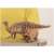 Schleich Edmontosaurus dinoszaurus figura, valósághű modell, barna és kék színű, járó pózban, egy gyermek tartja