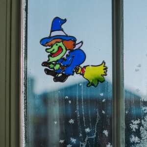 Halloween window sticker, witch on a broomstick, colorful design - Halloween decoration