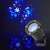 Nedis Decorative LED Snowflake Projector projecting snowflakes on a wall