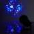 Nedis snowflake LED projector projecting snowflakes on a wall