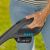 Close-up of Gardena SmallCut 23/18V cordless grass trimmer handle with battery