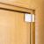 Shelly BLU Door/Window Sensor installed on a wooden door