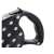 Close-up of the handle of a black and white polka dot retractable dog leash