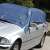 Kreator Tarpaulin protecting car from weather
