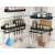 Black wall mounted spice rack with hooks and towel bar, VG-24255, shown in a kitchen setting