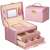 Springos jewelry box, pink, with gold accents, open, showing interior compartments and drawers