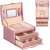 Springos jewelry box, pink, with gold accents, open, showing interior compartments and drawers