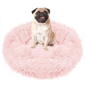 Pug stând pe patul pentru câini Springos roz, de pluș, în formă de gogoașă, mărimea S, 60 cm - Paturi pentru câini