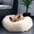 Dog Sleeping Comfortably in Springos Cream Plush Bed