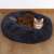Cat sleeping in a gray Springos round pet bed