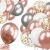 Close-up of Springos rose gold, silver, and white balloons with confetti