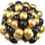 Pile of Springos black and gold party balloons