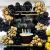 Springos black and gold balloon decoration with birthday cake