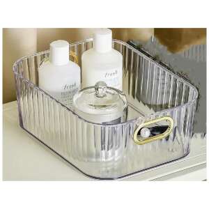 Clear plastic storage basket with gold handles, perfect for organizing bathroom essentials like toiletries, makeup, and hair products. - Storage & organization