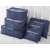 Set of 6 blue travel organizers for luggage, including mesh laundry bags