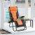 Delux Zero Gravity Chair, orange, in outdoor setting