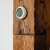 Tesla Smart Sensor temperature and humidity monitor, white, digital display, mounted on wooden beam