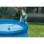 Woman using the Intex pool vacuum to clean an above-ground pool