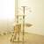 Beige Pepita cat tree with scratching post, condo, hammock, and platforms in a home setting