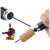 Close-up of a black pneumatic wine opener with a needle and a cork